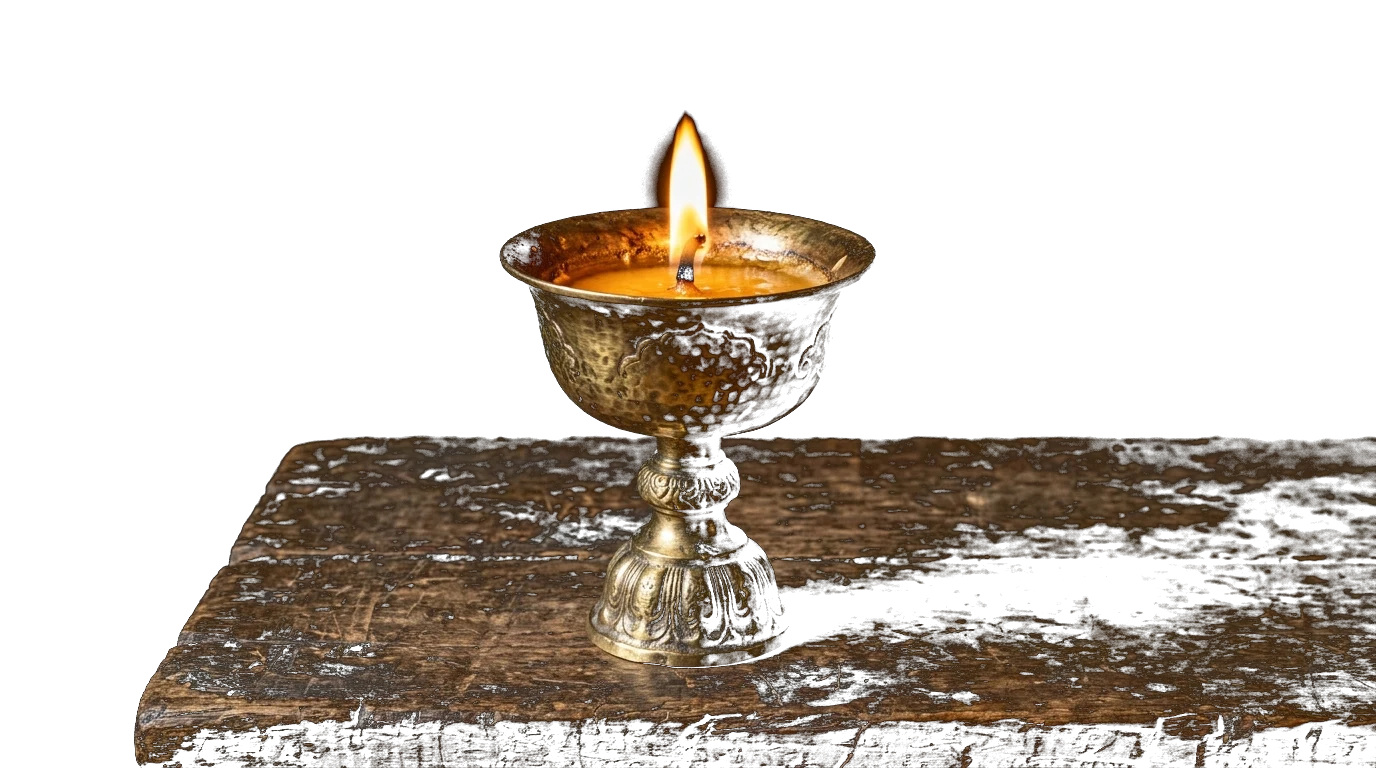Traditional brass butter lamp foreground