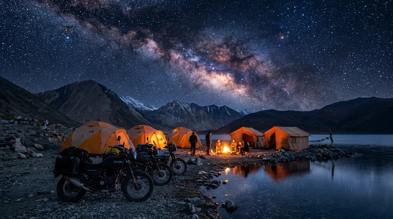 Motorcycles and glamping tents under the Milky Way at Pangong Lake